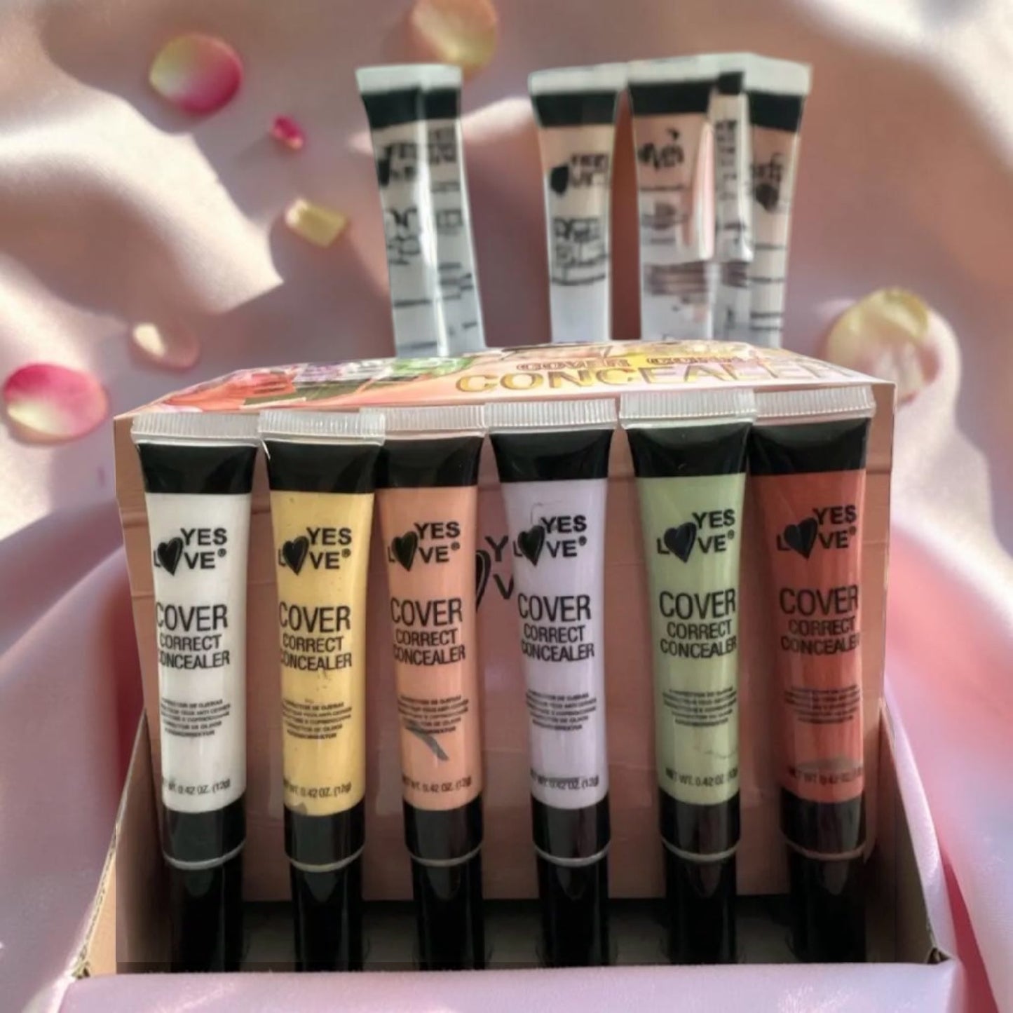 Correcteur avec applicateur multicolore